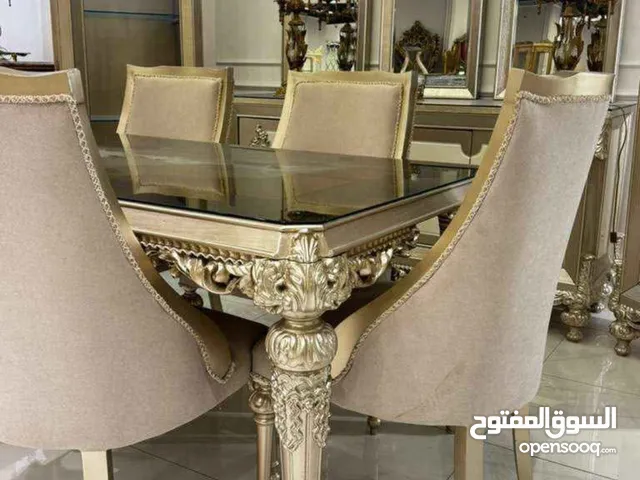 ترابيزة سفره دهبي مع عدد ست كراسي تنجيد