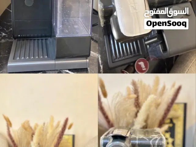 مكينة نسبريسو لاتيسما صنع القهوة شبه جديده.