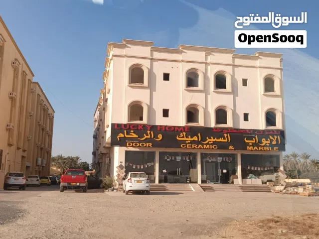 مبنى سكني تجاري للبيع في صحار ع الشارع الرئيسي في  صناعية مويلح
