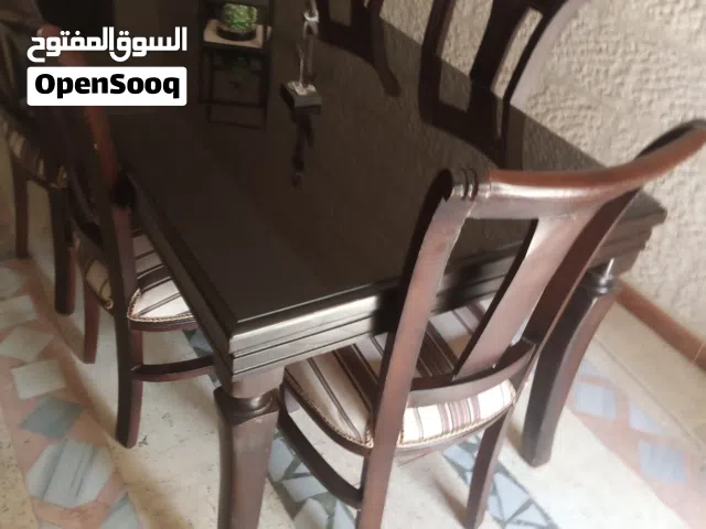 طاوله سفره 8 كراسي خشب زان سعر الشراء 700 سعر البيع 200