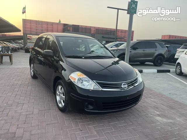 Nissan Versa 2012 with rings cruise control very clean