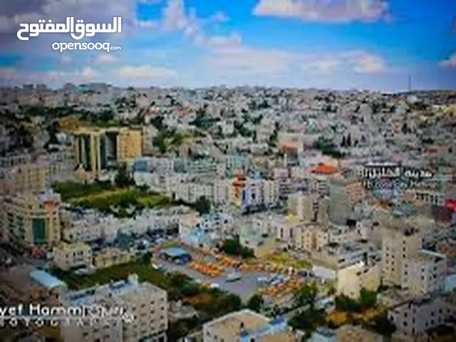 شقه مكتبية مكونه من طابقين كل طابق 50 م على شارع الحرس الرئيسي بجانب بنك فلسطين