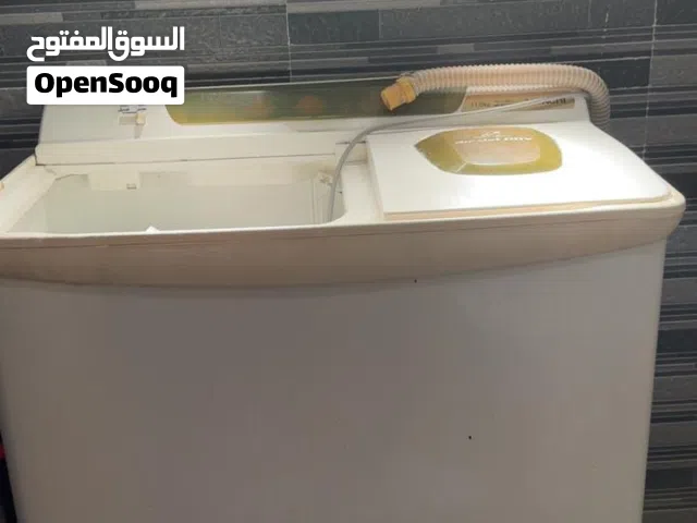 غساله هيتاشي تغسل وتعصر وتنشف 12 كيلو