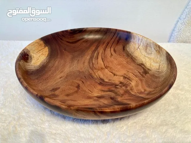 الذوق العربي على أصوله... بأطباق خشب فخمة