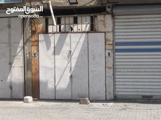 كراج + محل الكراج يصلح مخزن او تصليح سيارات او معرض المحل على الشارع الرئيسي يصلح لكل شي