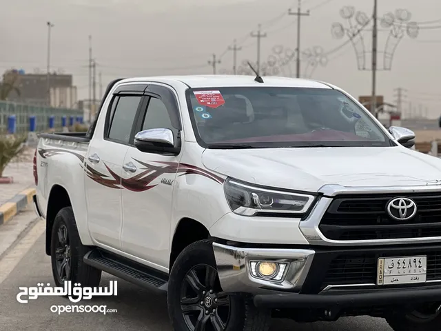تيوتا هايلوكس 2022 فور ويل 4x4 كير عادي مكفوله كفاله عامه رقم بغداد