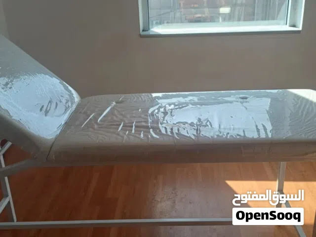 سرير فحص طبي قابل للتعديل غير مستعمل
