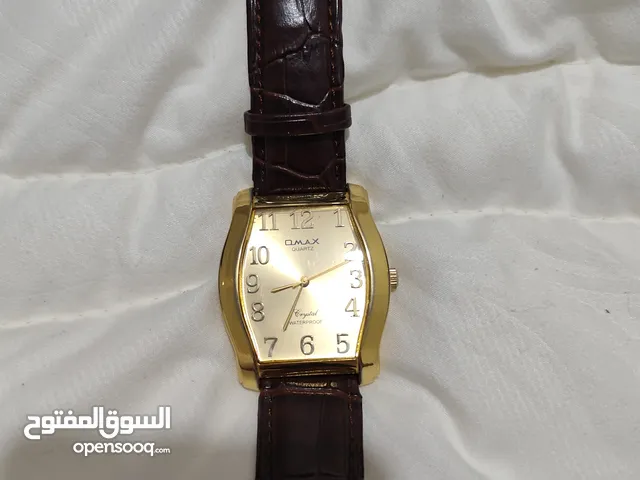 ساعه omax باللون الذهبي