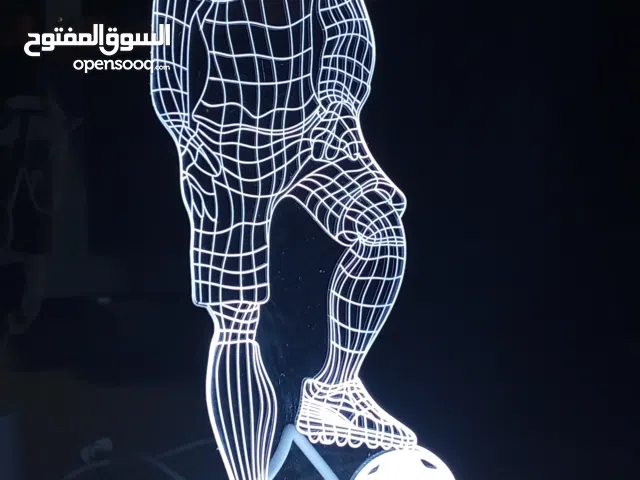 إضاءة شكل لاعب كرة قدم