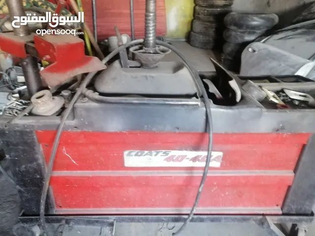 ماكينة بناشر بحال الوكالة مع المعلقة الأصلية للبيع
