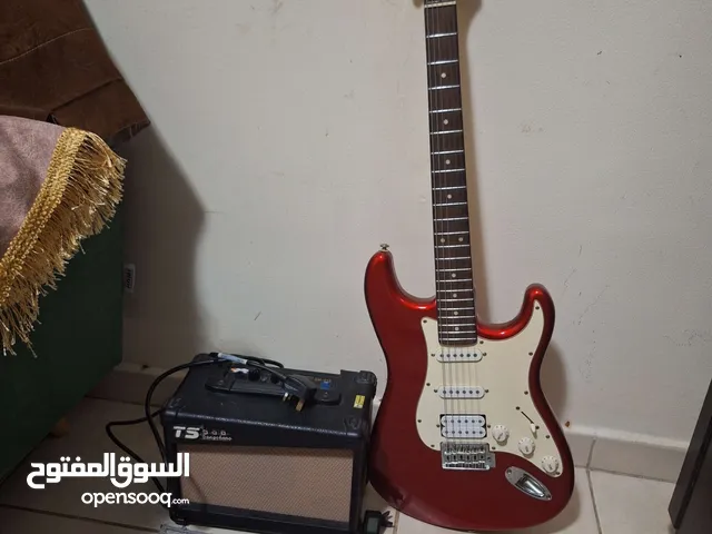 BUSKERS ELECTRIC GUITAR AND 20 WATT AMPLIFIER, negotiable price (comes with tuner and picks)