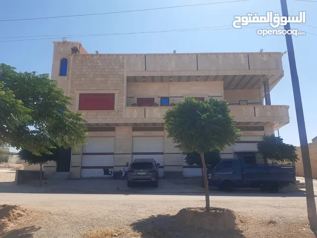 بسم الله الرحمن الرحيم للبيع بناء طابقين ارضي 350 متر اربع محلات ومستودع كبير وطابق ثاني شقتين