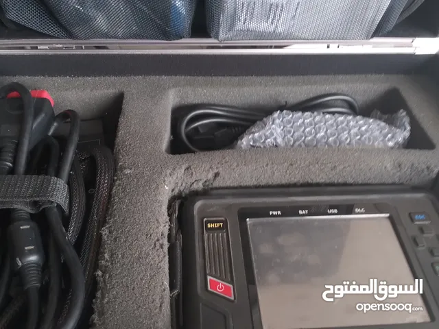 جهاز فحص سيارات كومبيوتر وجهاز تنظيف بخاخات