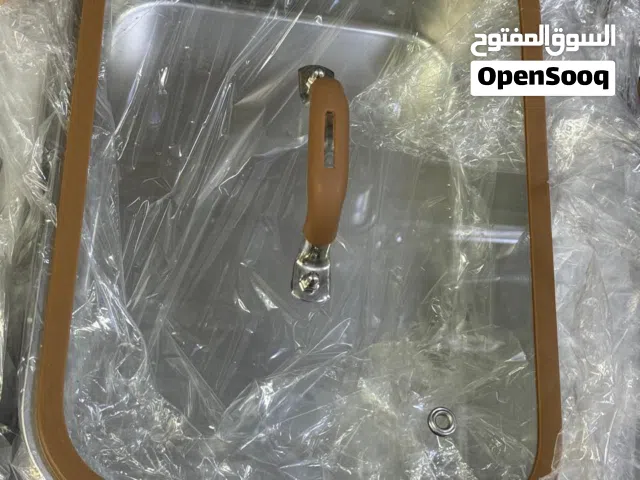 صينية تقديم وتنفع للخبز