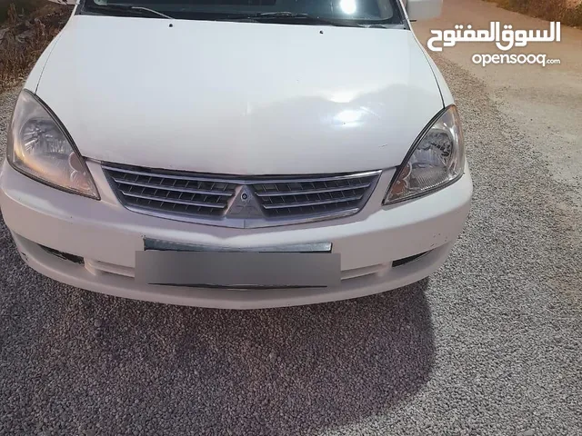 للبيع مستوبيشي لانسر موديل 2014 متور 16 اصلي وارد الكويت جير تومتيك توب ترنك