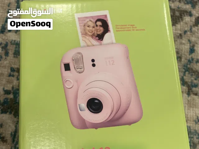 Camera instax mini 12  fujifilm  كاميرا فورية  غير مستعملة  مع جميع الملحقات