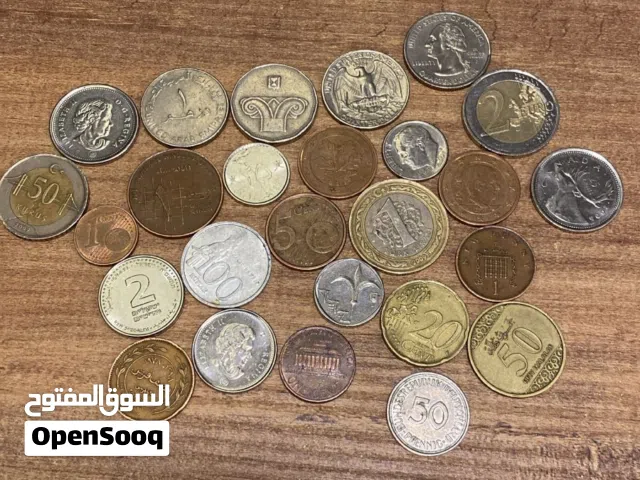مجموعه من العملات المعدنية القديمه نوعا ما