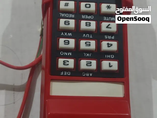 للبيع: هاتف أرضي أنتيك قديم باللون الأحمر المميز - حقبة الثمانينات