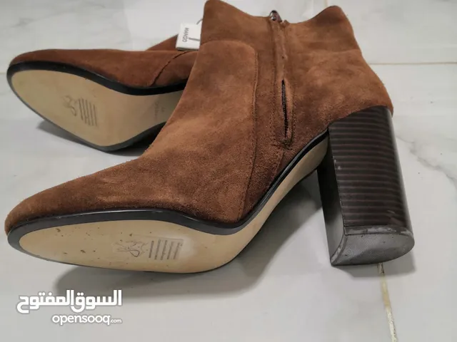brown Boots in Muscat