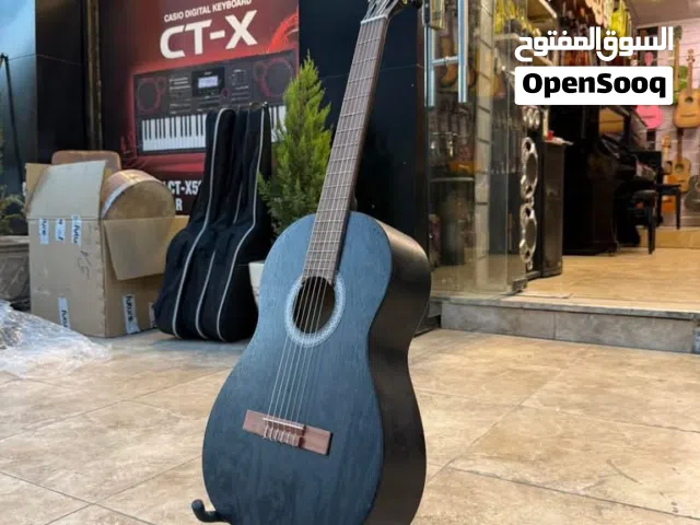جيتار قاروط  m10 صناعة يدوية  بسعر 75  دينار  شامل  حقيبة وريشة