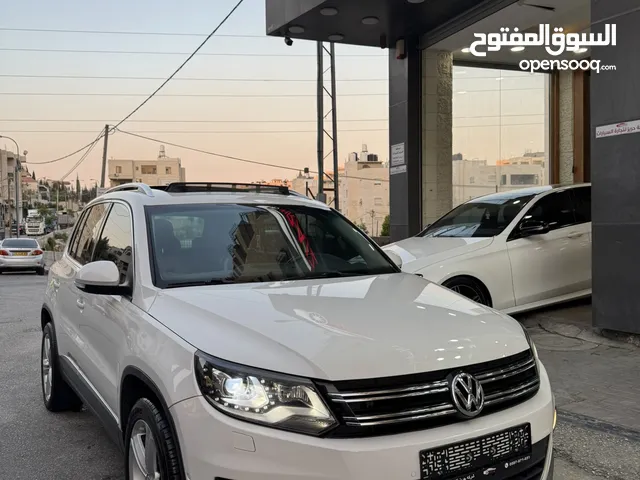 فوكس فاجن تيجوان 2012 بنزين متور 2000 تيربو 4x4 فتحة سقف بانوراما فرش بني مميز عداد قليل فحص ممتاز