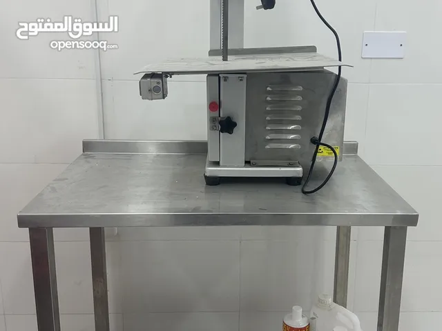 Meat cutting machine with stand