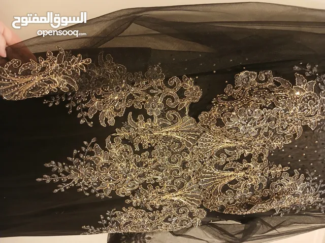 فستان سورية اسود في تطريز ذهبي شغل هاند ميد