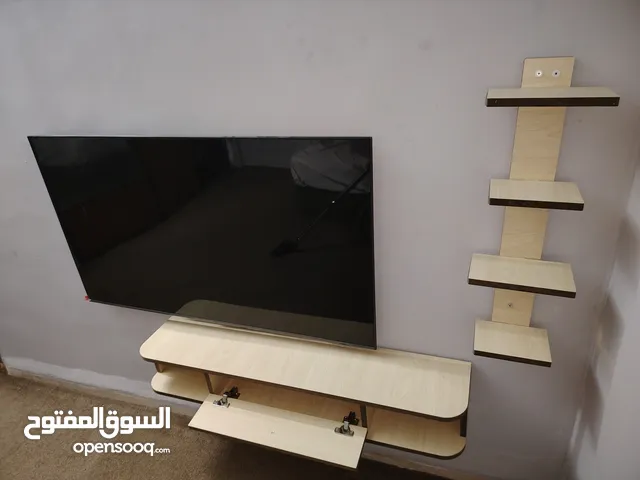 رف حائط للتلفزيون