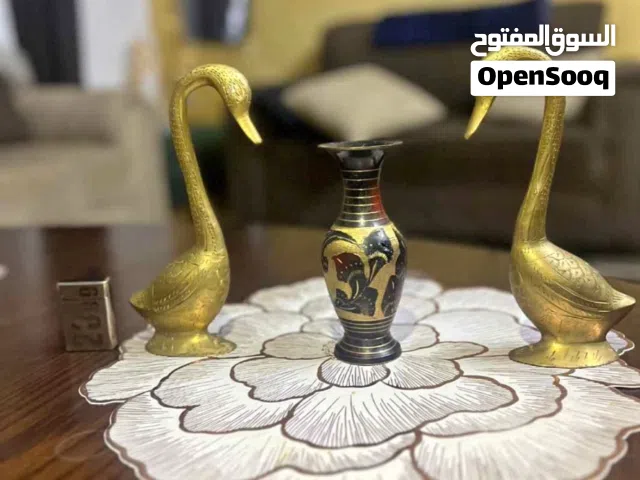 بط نحاس صب عدد 2 ارتفاع 18 سم ومزهريه نحاس مرسمه