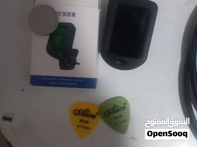 تونر جهاز الدوزات لجميع الآلات الوتريه + هدية ثلاث ريشات من الوان من اختيارك