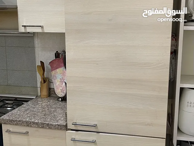 kitchen cupboard with marble small slab