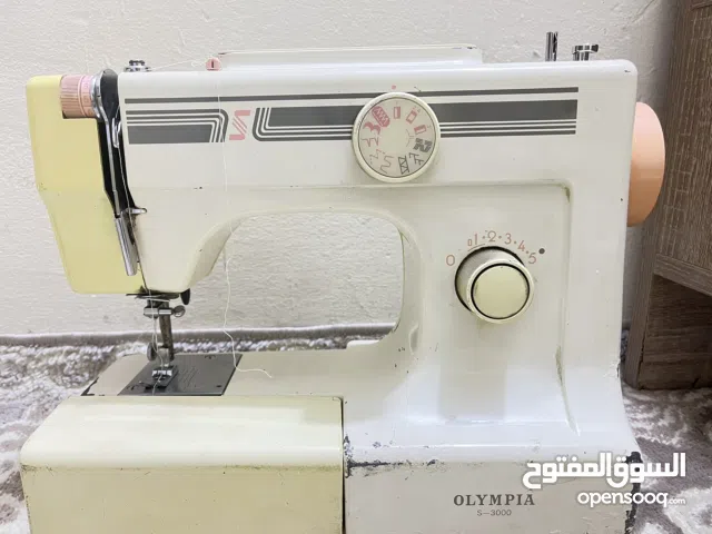 مكينه خياطه برذر.