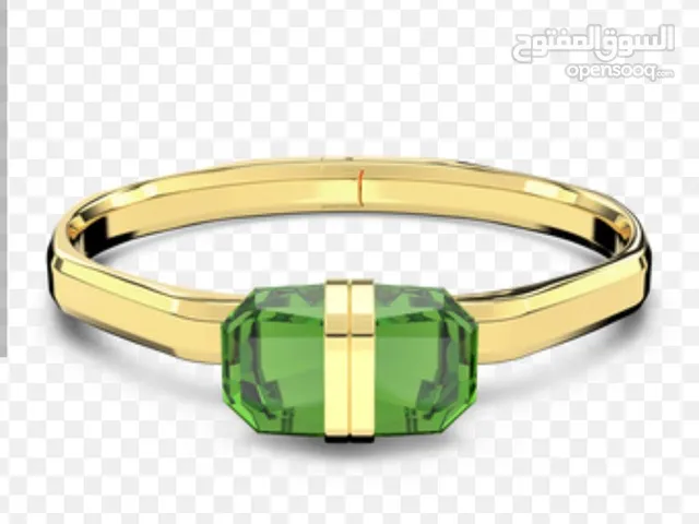 اكسسوار فاخر من براند سوارفسكي بالحجر الكريم مطللي بالذهب الصافي عيار 18
