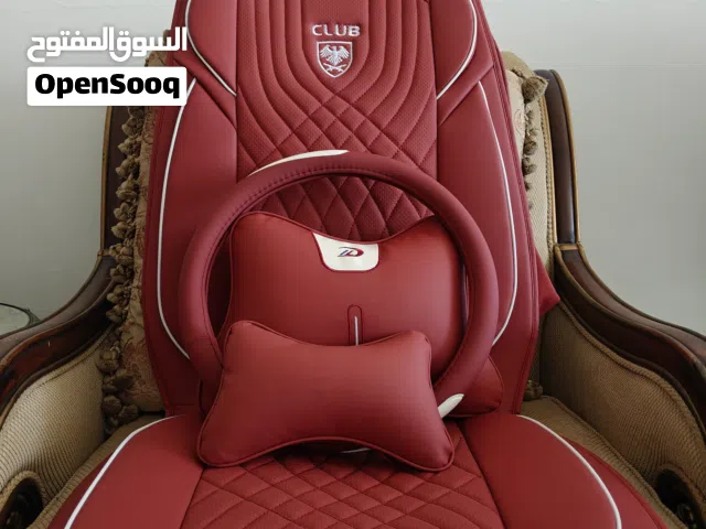 Completely brand new 5 full Car seat Covers includes multiple cushions, and a stearing wheel cover.