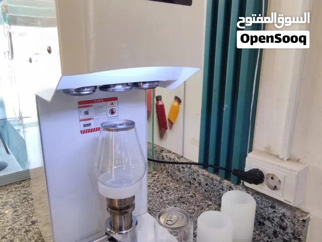 مكينة تصكير العلب العصير