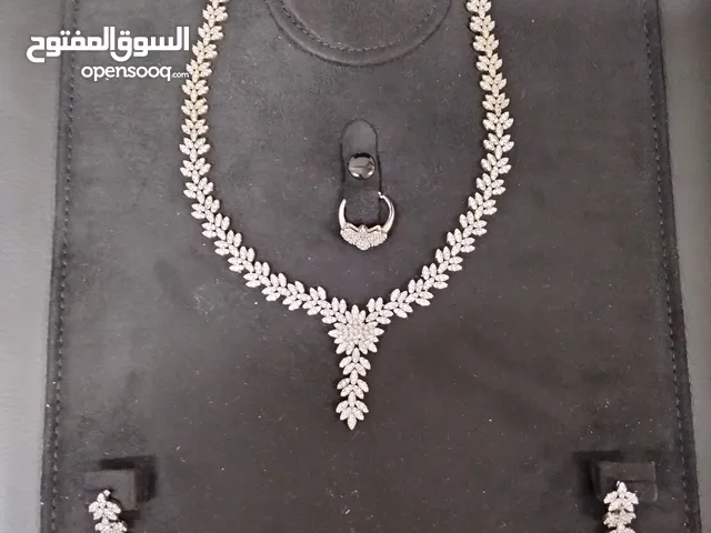طقم كامل نسائي زيركون اصلى قلادة وحلق واسورة وخاتم جديد جدا Necklace , earrings, bracelet and ring