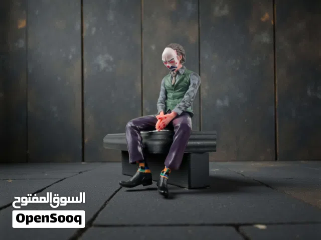 مجسم الجوكر الجالس للسيارات والمكاتب