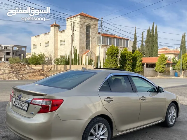 تويوتا كامري 2014 فحص كامل فل الفل بفتحه لون شمباني مميز بسعر مغري قابل للبدل