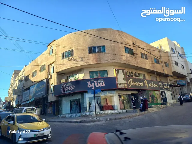 مجمع تجاري للبيع(موقع مميز)