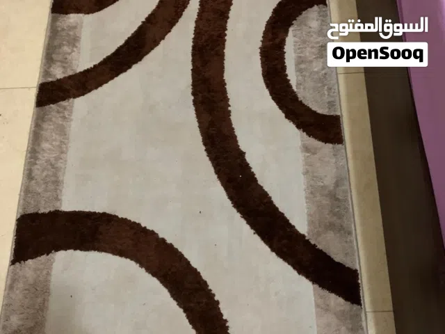 3 assorted rugs