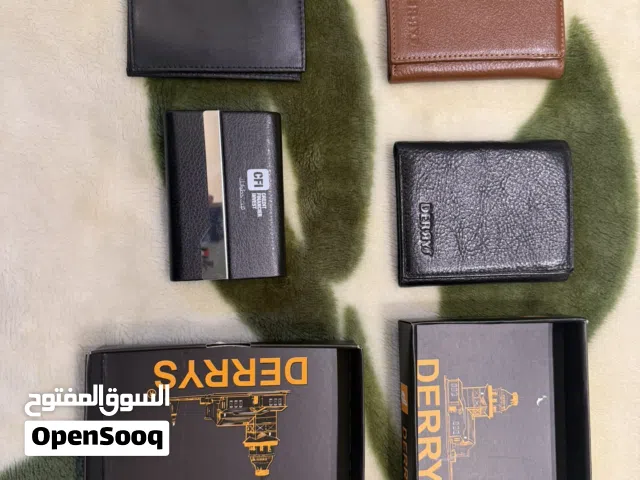 تشكيلة متنوعة من المحافظ الرجالي الاصلية