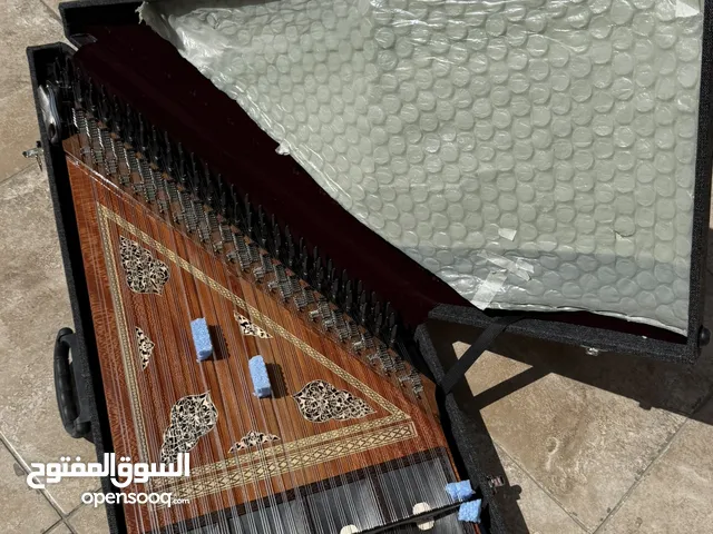 قانون تركي لون عسلي صناعه مصطفى ساجلاما مع حقيبه هاردكيس لون اسود