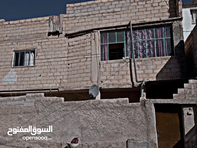 90 m2 5 Bedrooms Townhouse for Sale in Zarqa Russayfah