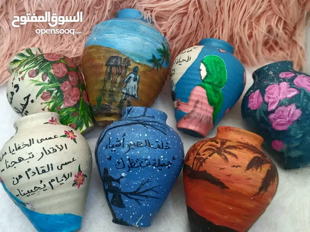 شقاقة /حصالة نقود/فخار ملونة رسمات وكلمات