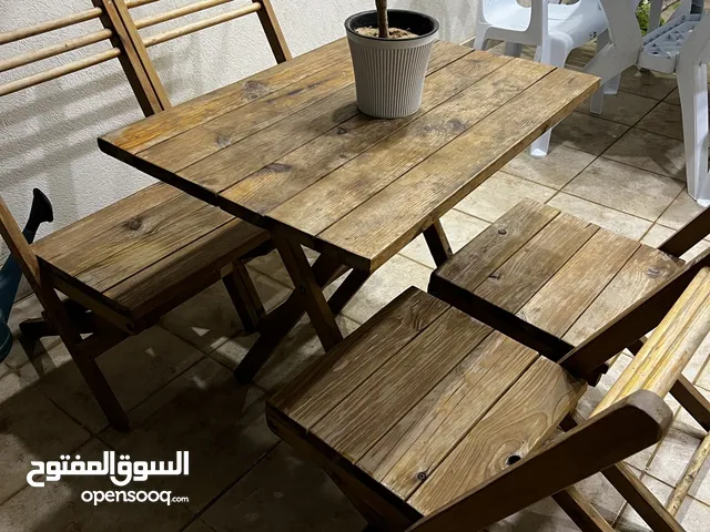 طاولة خشب موديل حديت تطبق معاها اربعة كراسي