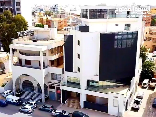 مبنى تجاري للبيع من 4 طوابق وملحق في طرابلس زاوية الدهماني
