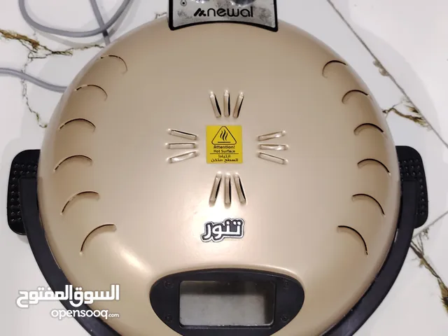 تنور كهربائي ابو الشاشه للبيع لون ذهبي درجه حراره عاليه جدا مفيد جدا للمعجنات والشوي