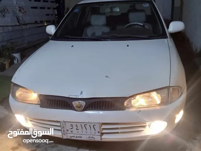 سيارة بروتون 2004 لون ابيض نضيفة