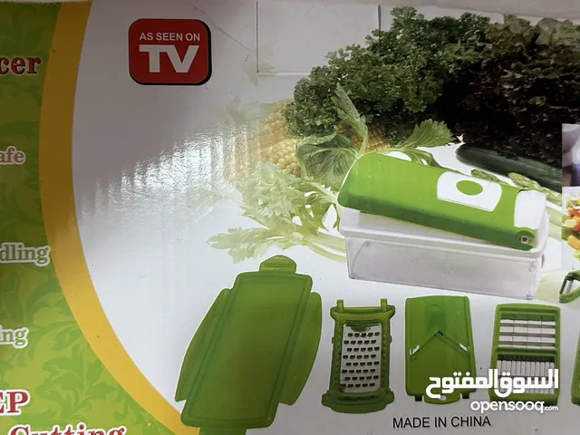 تقطيع البطاطا والبصل والخضراوات