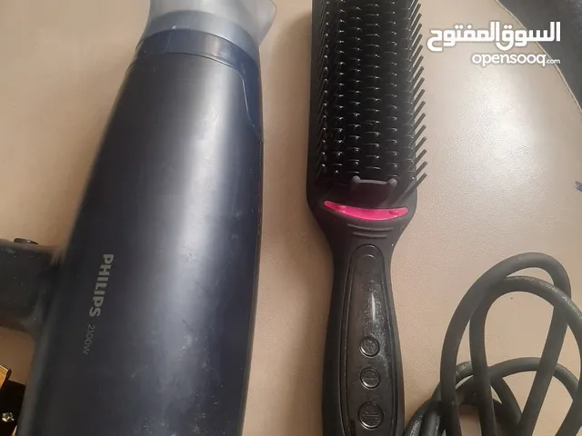 استشوار الشعر ماركة فيليبس 2100واط شغال تمام + فرشاة مكواة الشعر ماركة ريفلون استعمال خفيف شغال تمام